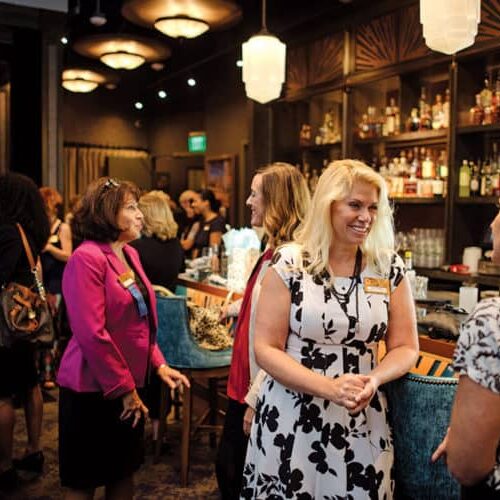 Karen Pitsley, owner of Transforming Architecture, chats with other members of the Business Women’s Network group at the monthly meeting held at Cured restaurant in Howard County.